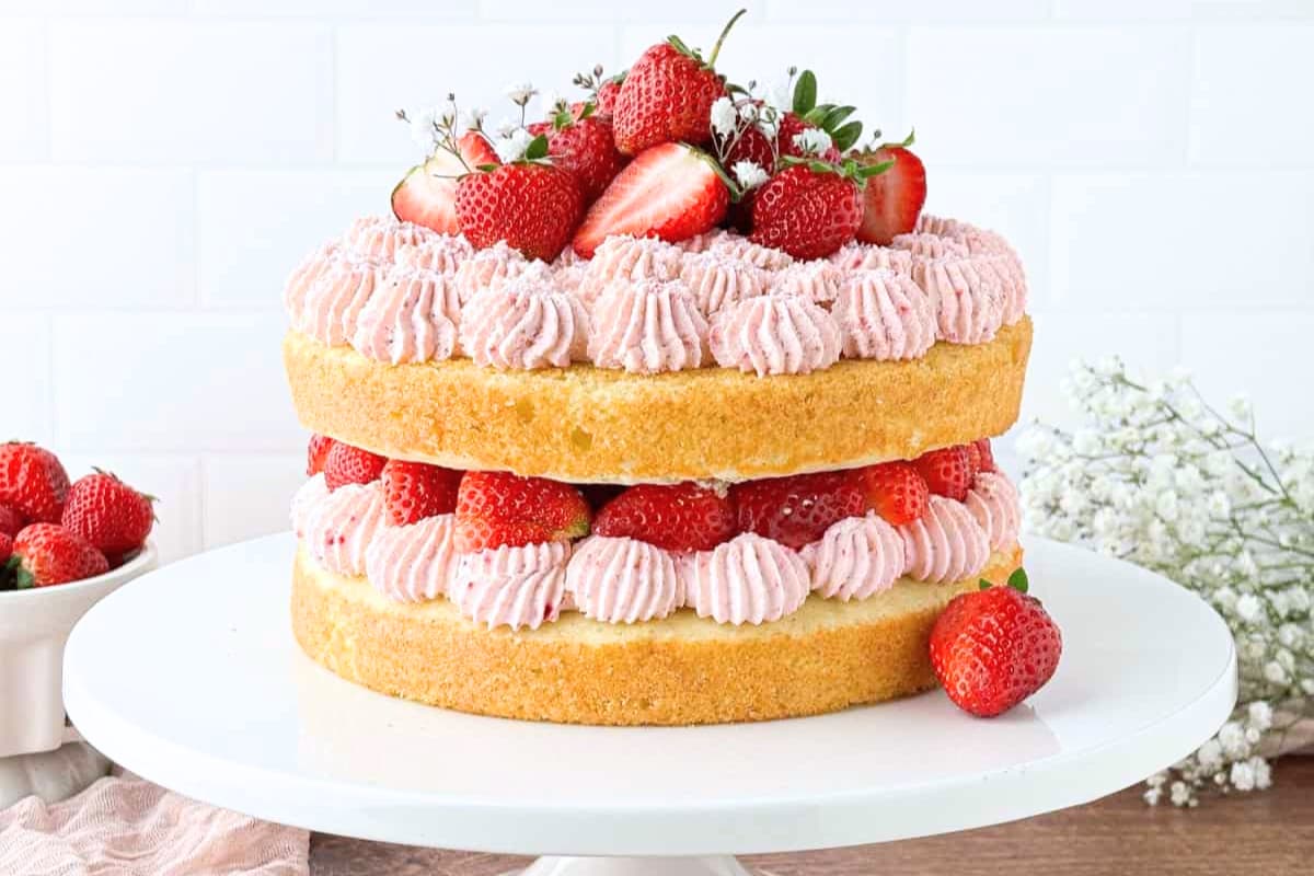 A plate of Strawberry Whipped Cream Cake.
