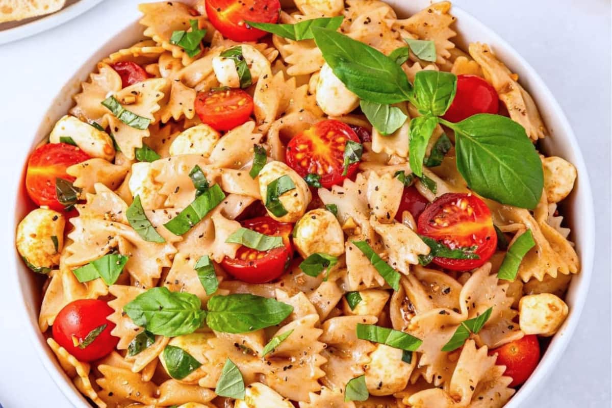 A bowl of Tomato Basil Pasta Salad.