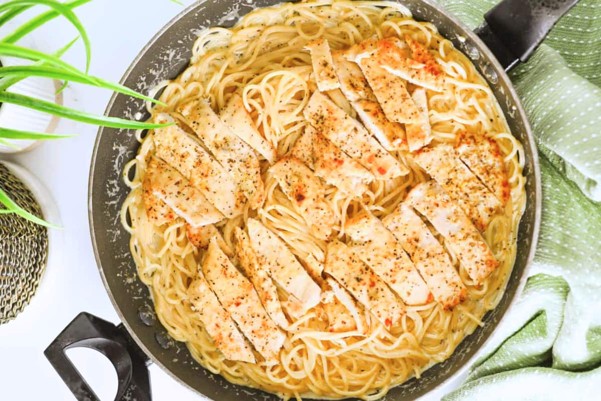 A skillet of lemon chicken pasta.