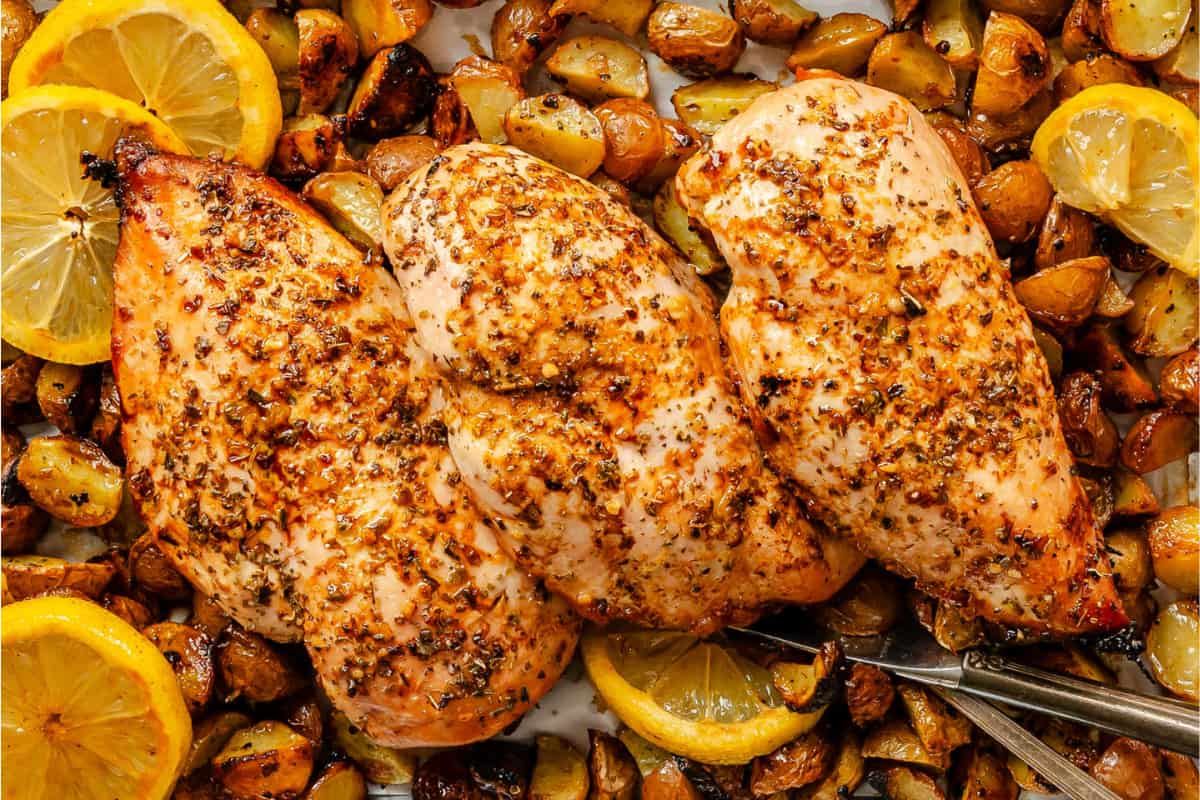 A pan of Sheet Pan Lemon Garlic Chicken and Potatoes.