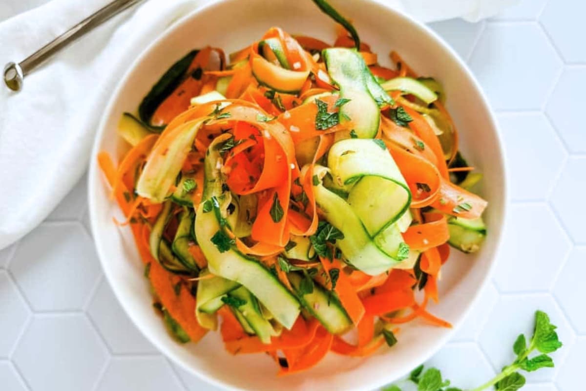 A bowl of Carrot and Cucumber Salad Recipe.