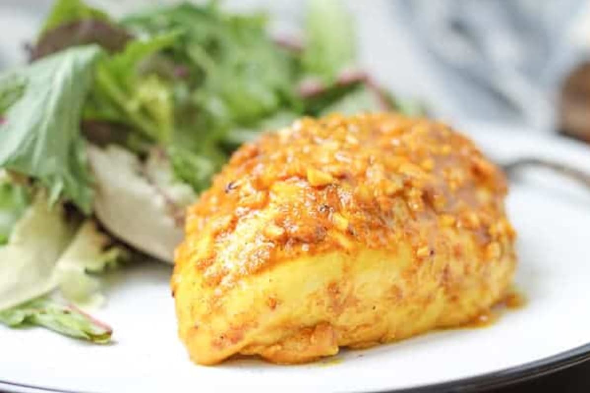 A plate of Curry Spiced Chicken Breasts.