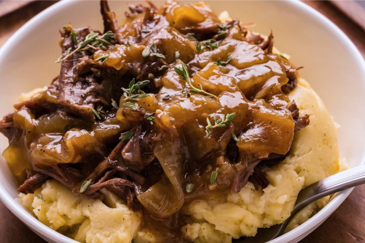 A dish of French Onion Pot Roast.