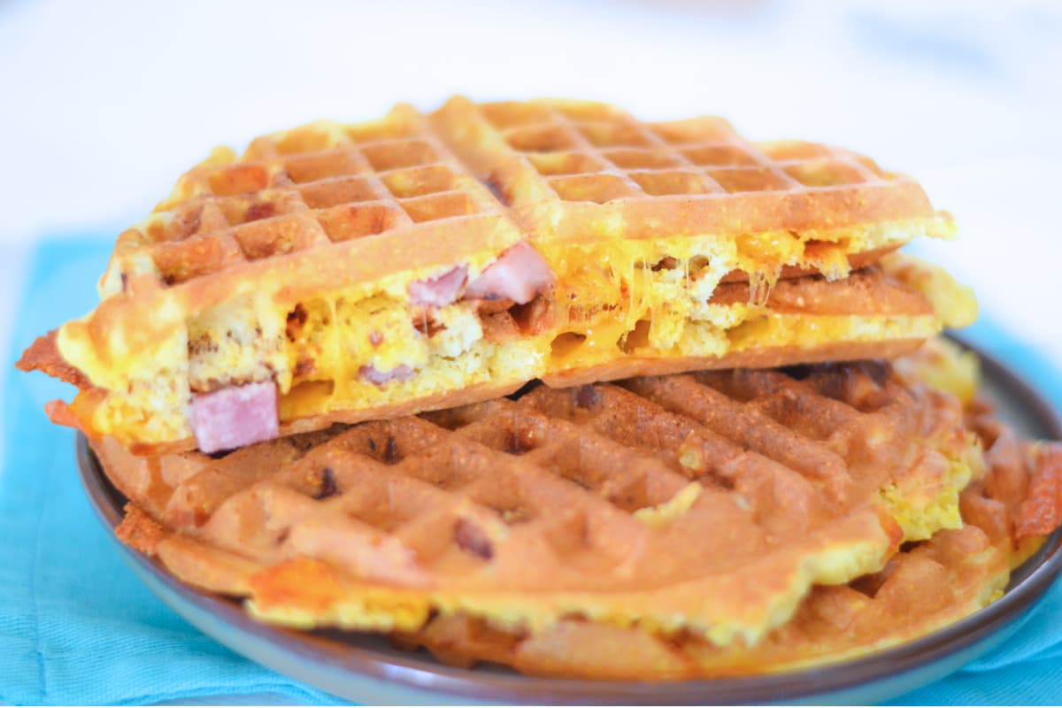 A plate off Ham and Cheese Waffles.