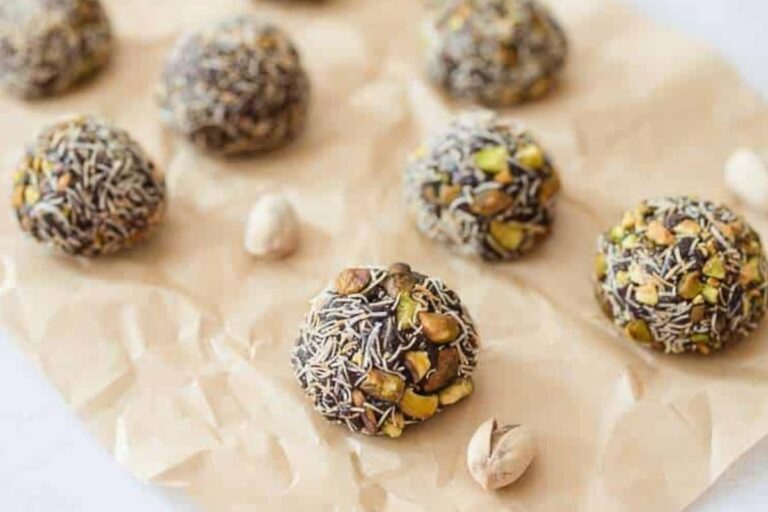 A plate of Dubai Chocolate Pistachio Protein Energy Balls.