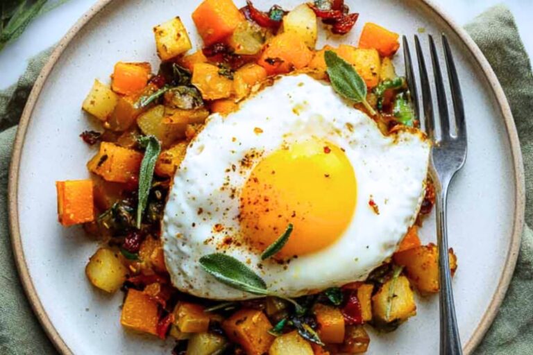 A plate of Butternut Squash Hash and Eggs.