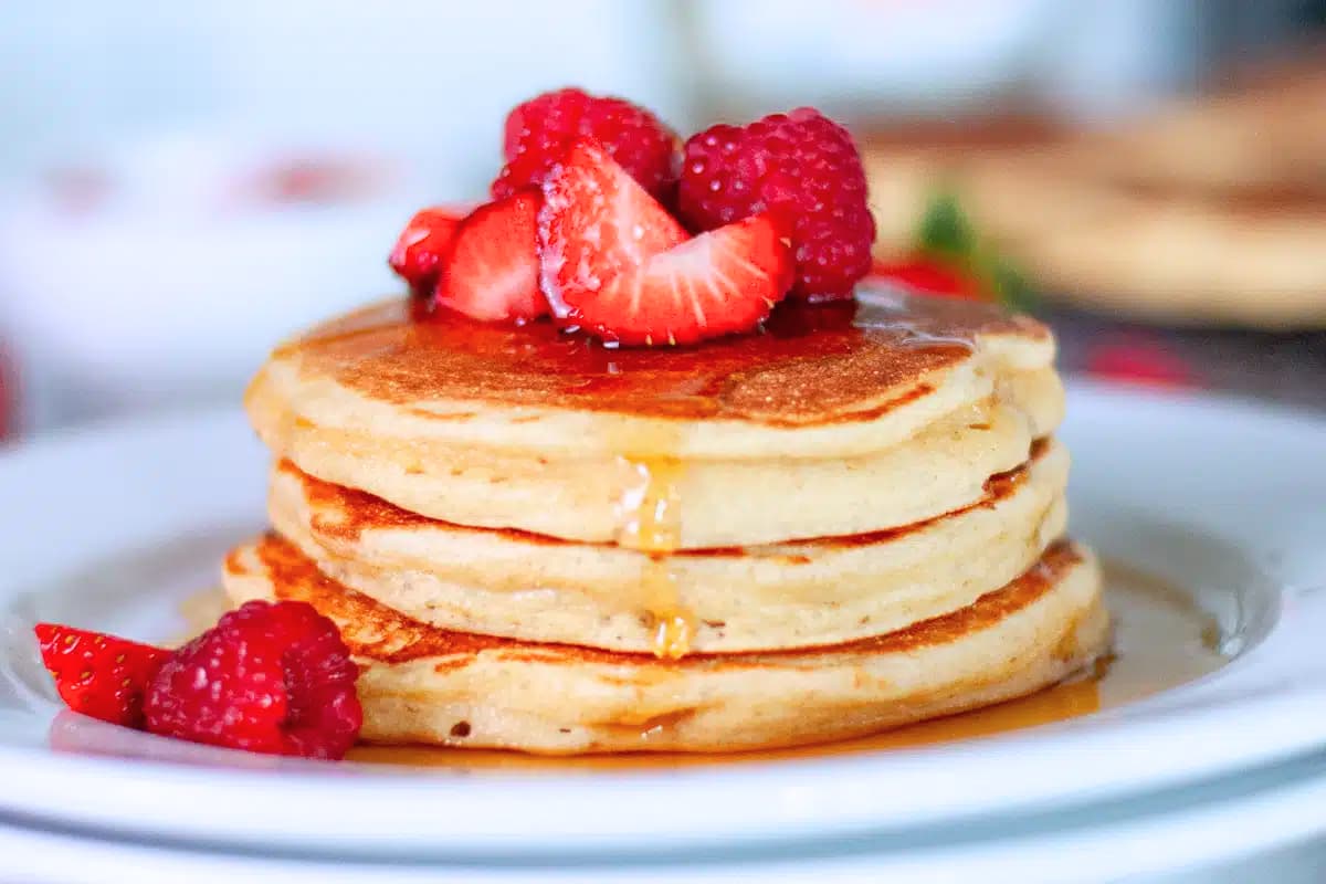 A plate of Fluffy Whole Wheat Cottage Cheese Pancakes.
