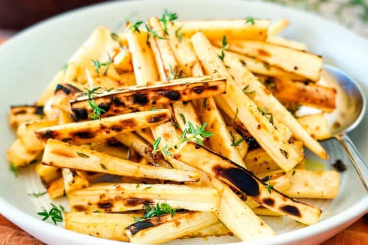 A plate of Simple Honey and Mustard Roasted Parsnips.