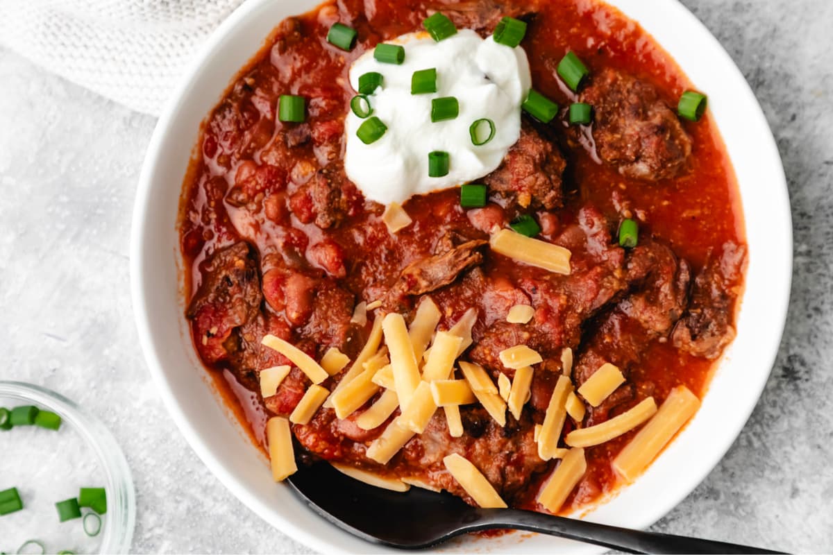 A bowl of Instant Pot Shredded Beef Chili.