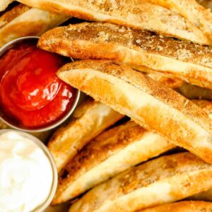 A tray of baked potato wedges.