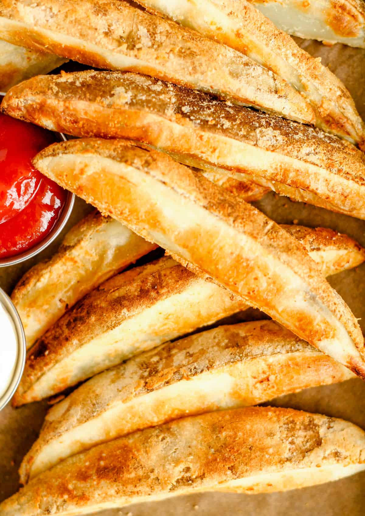 A tray of baked potato wedges.