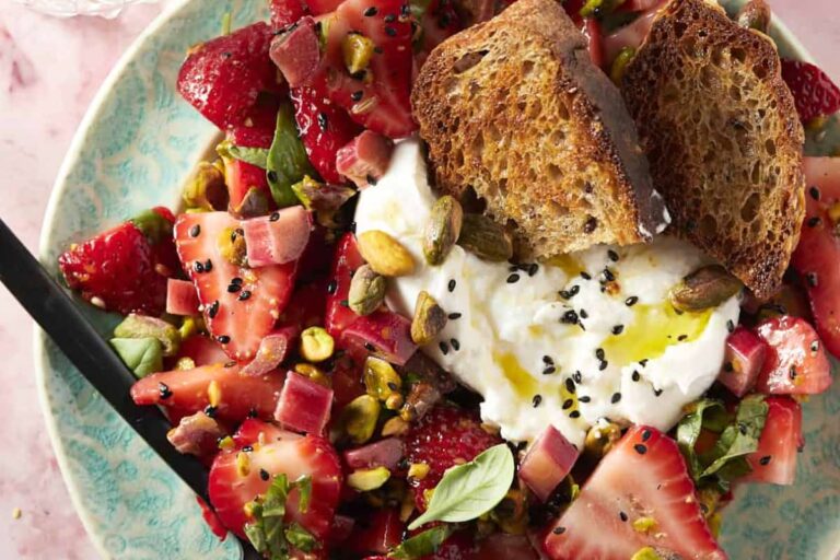 A plate of Pickled Rhubarb and Strawberry Salad with Burrata.