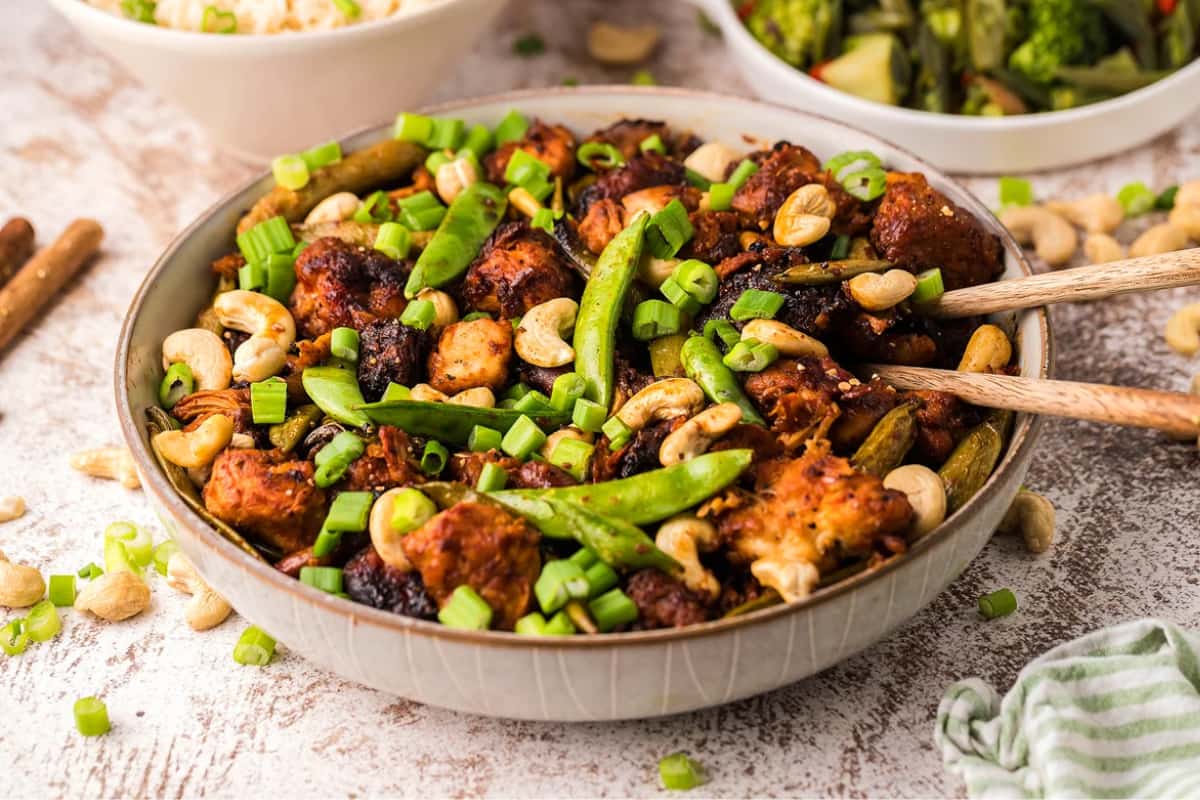 A bowl of Slow Cooker Cashew Chicken.