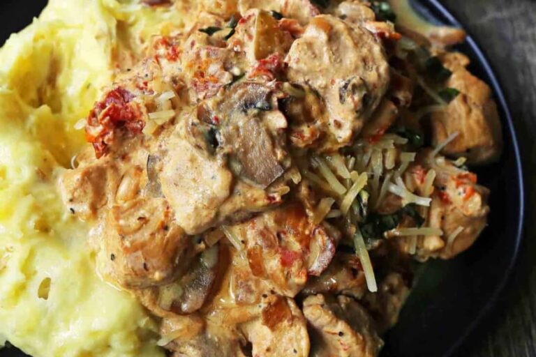 A dish of slow cooker tuscan chicken.