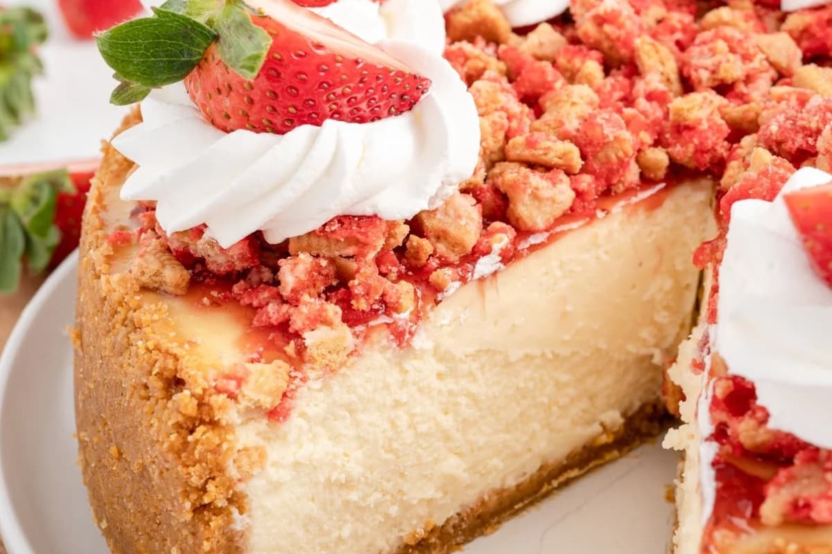 A plate of Strawberry Crunch Cheesecake.