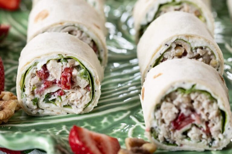 A plate of Strawberry Chicken Salad Sandwich Roll-Ups.