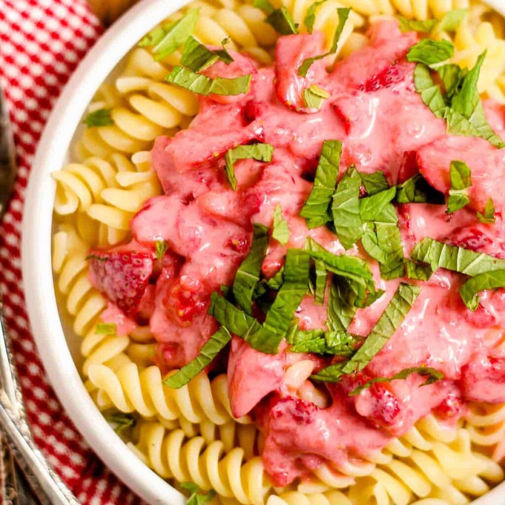 A dish of strawberry pasta.