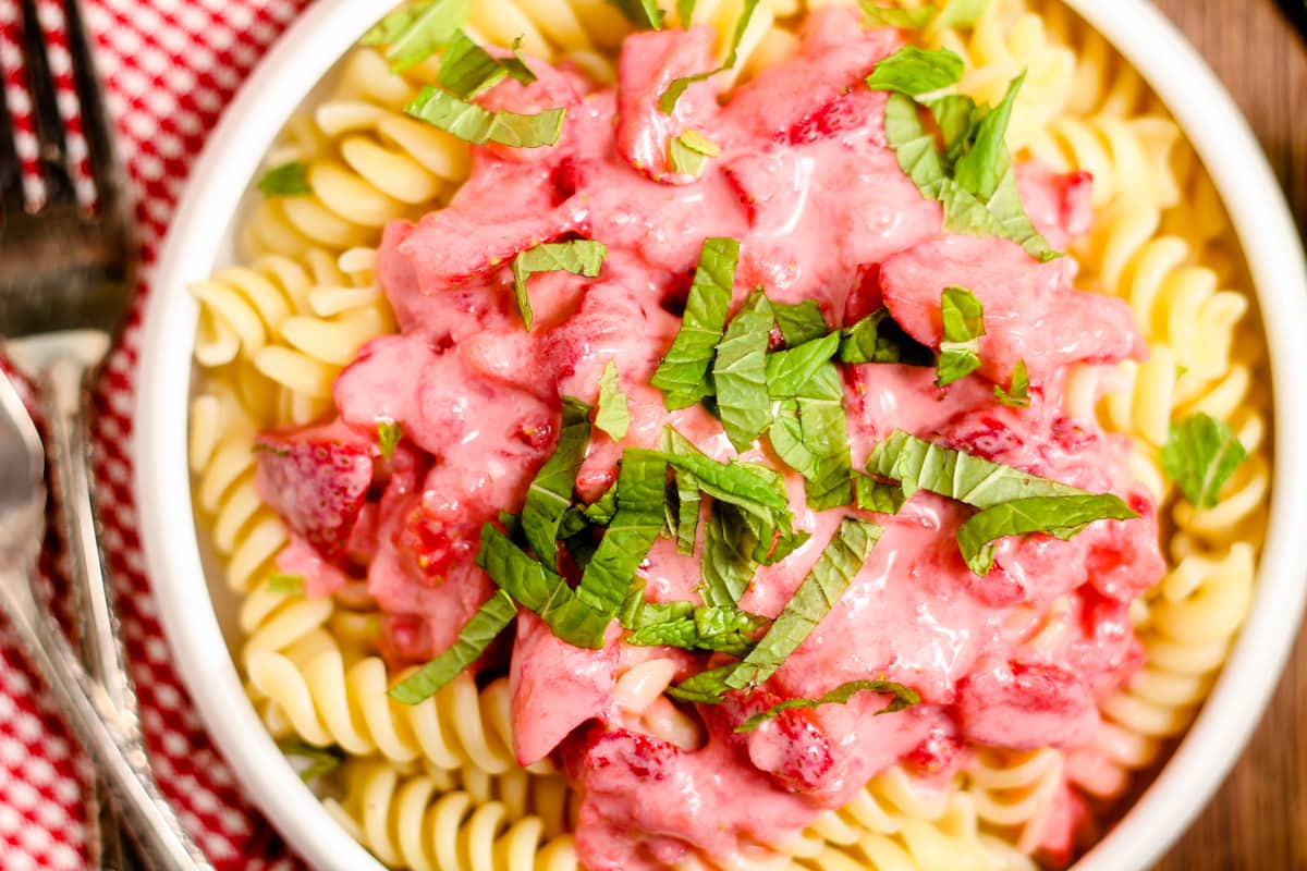 A dish of strawberry pasta.