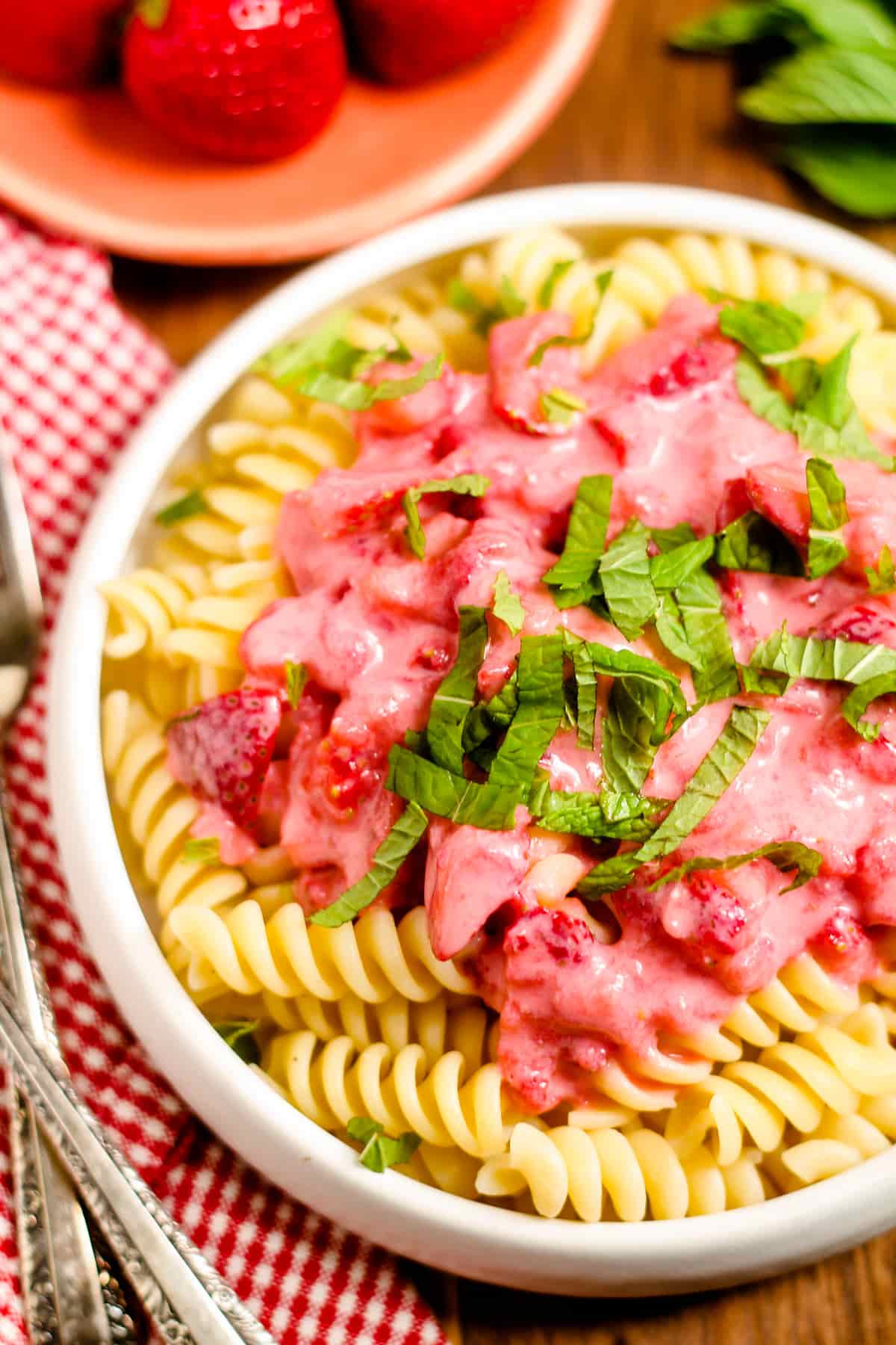 A dish of strawberry pasta.