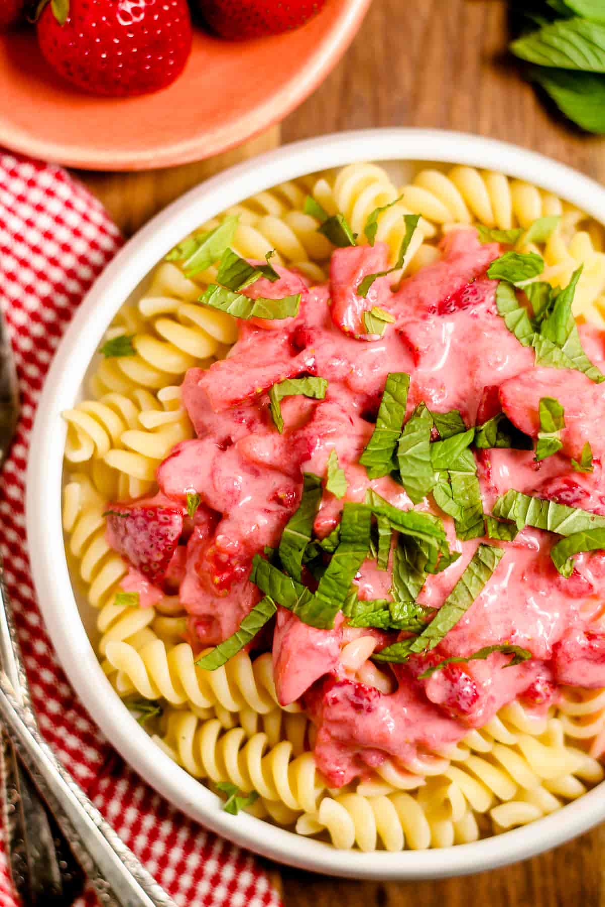 A dish of strawberry pasta.