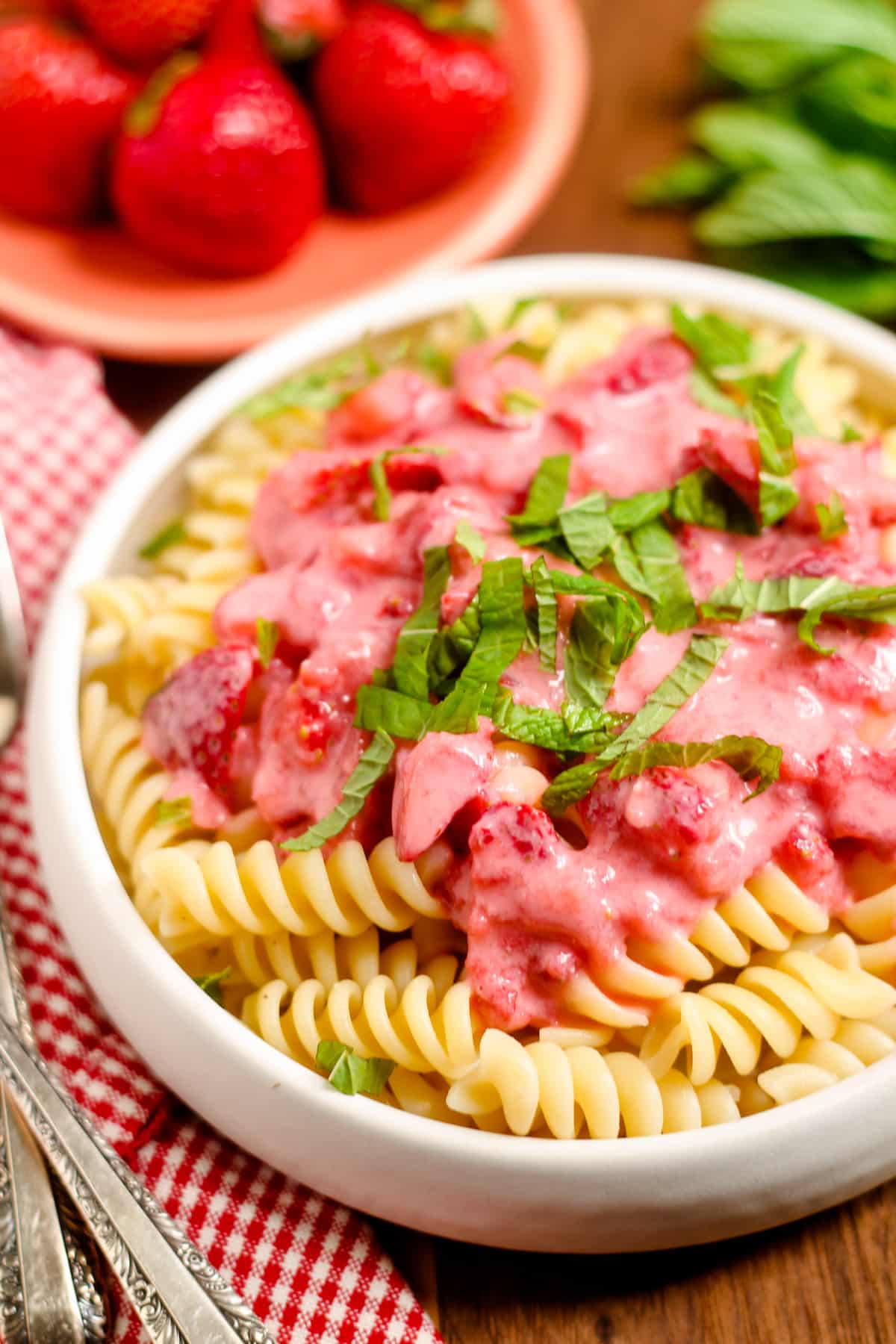 A dish of strawberry pasta.