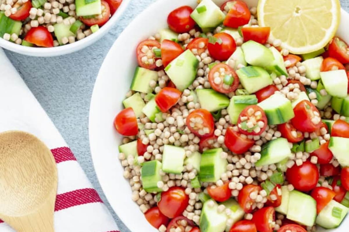 A bowl of Mediterranean Cucumber Tomato Salad.