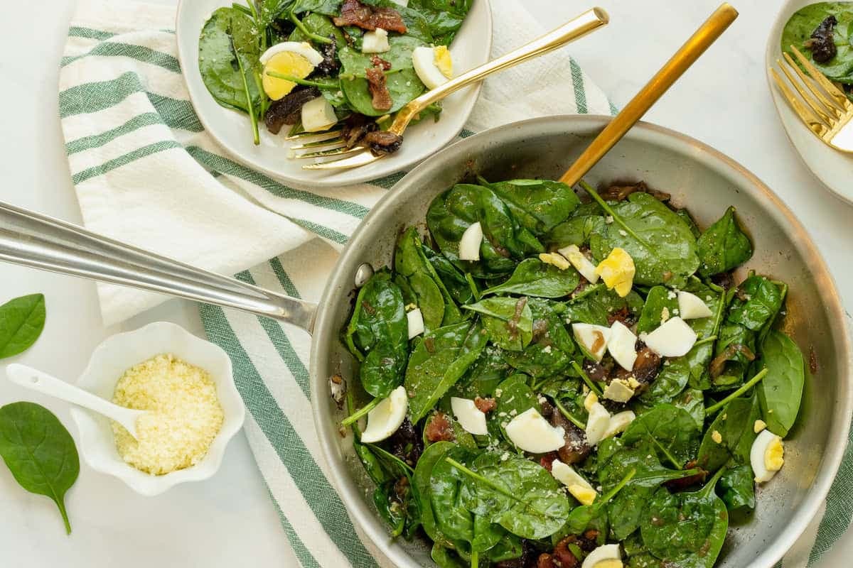 A dish of Warm Spinach Salad.