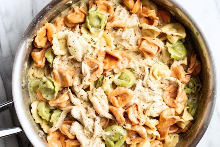 A dish of Pesto Chicken Tortellini.