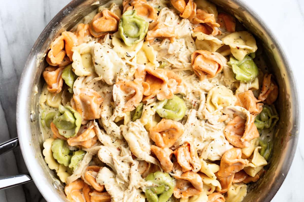A dish of Pesto Chicken Tortellini.