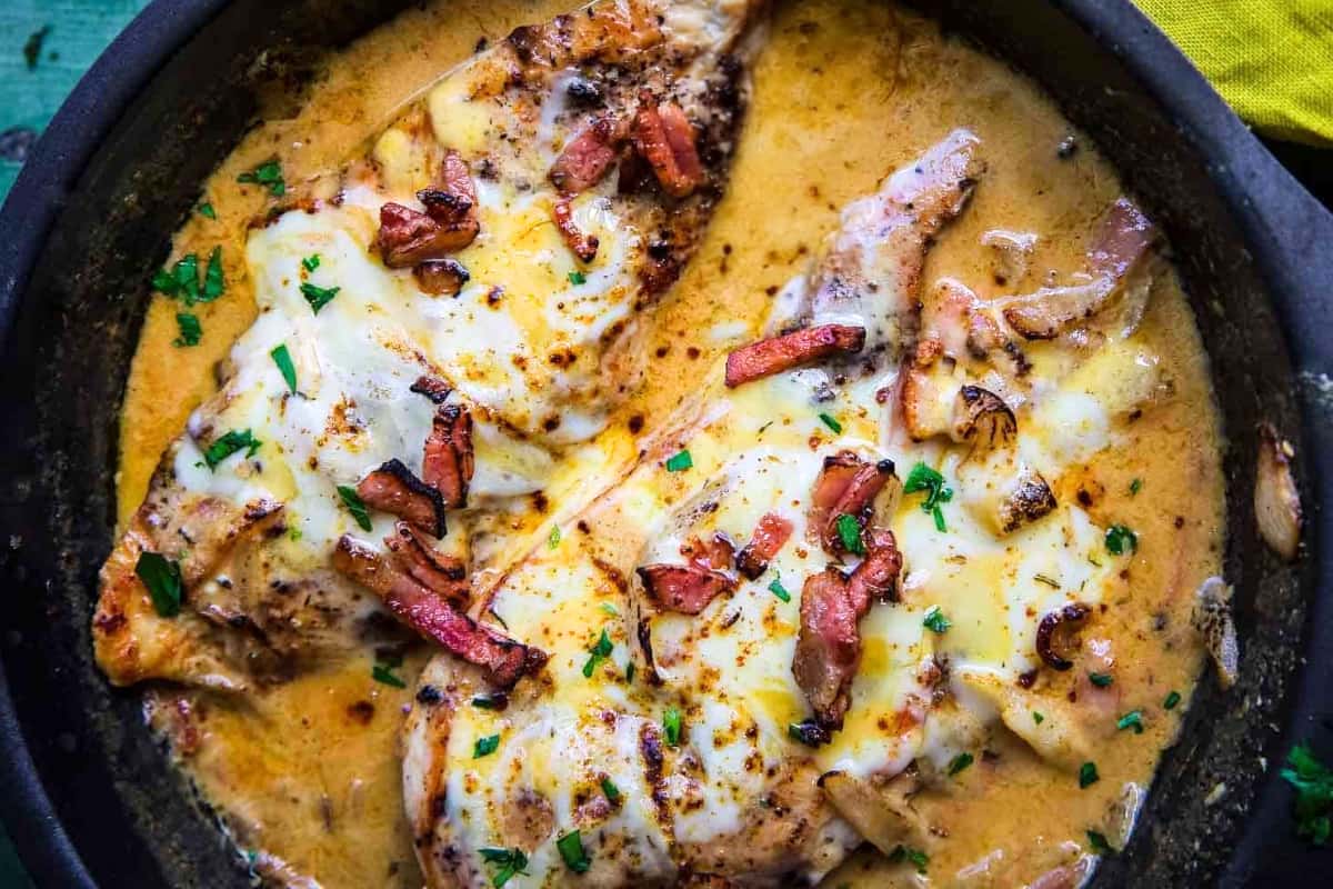 A dish of Smothered Chicken with Onion Gravy.
