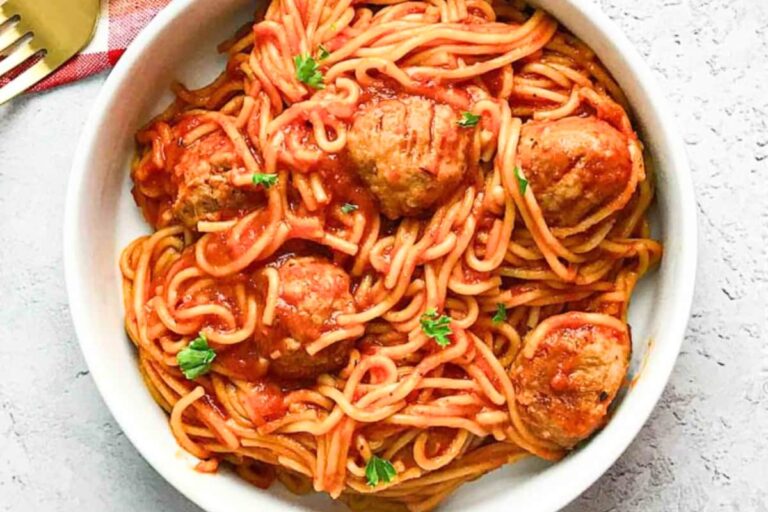 A dish of Instant Pot Spaghetti and Chicken Meatballs.