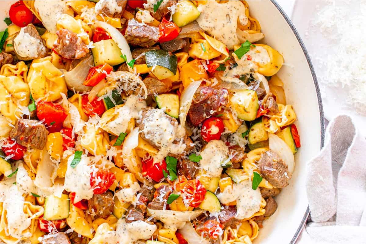 A dish of Garlic Parmesan Steak Tortellini.