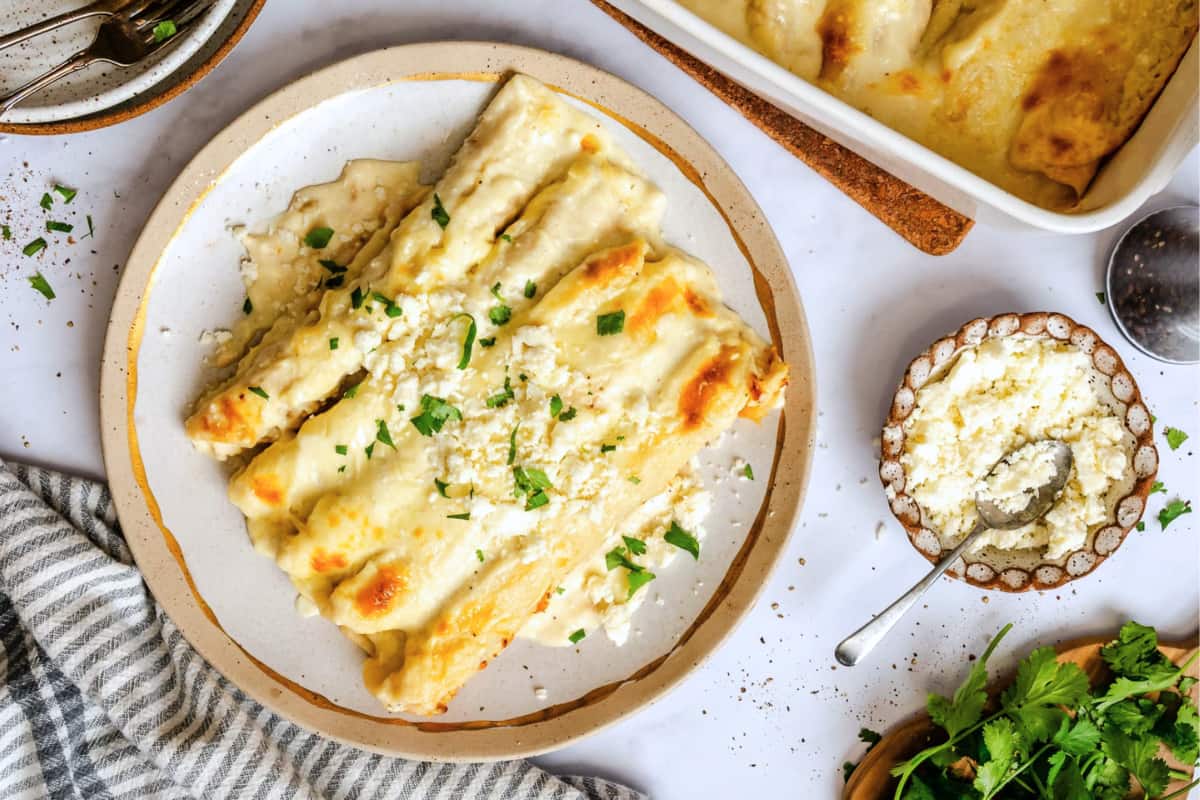 A dish of White Chicken Enchiladas.
