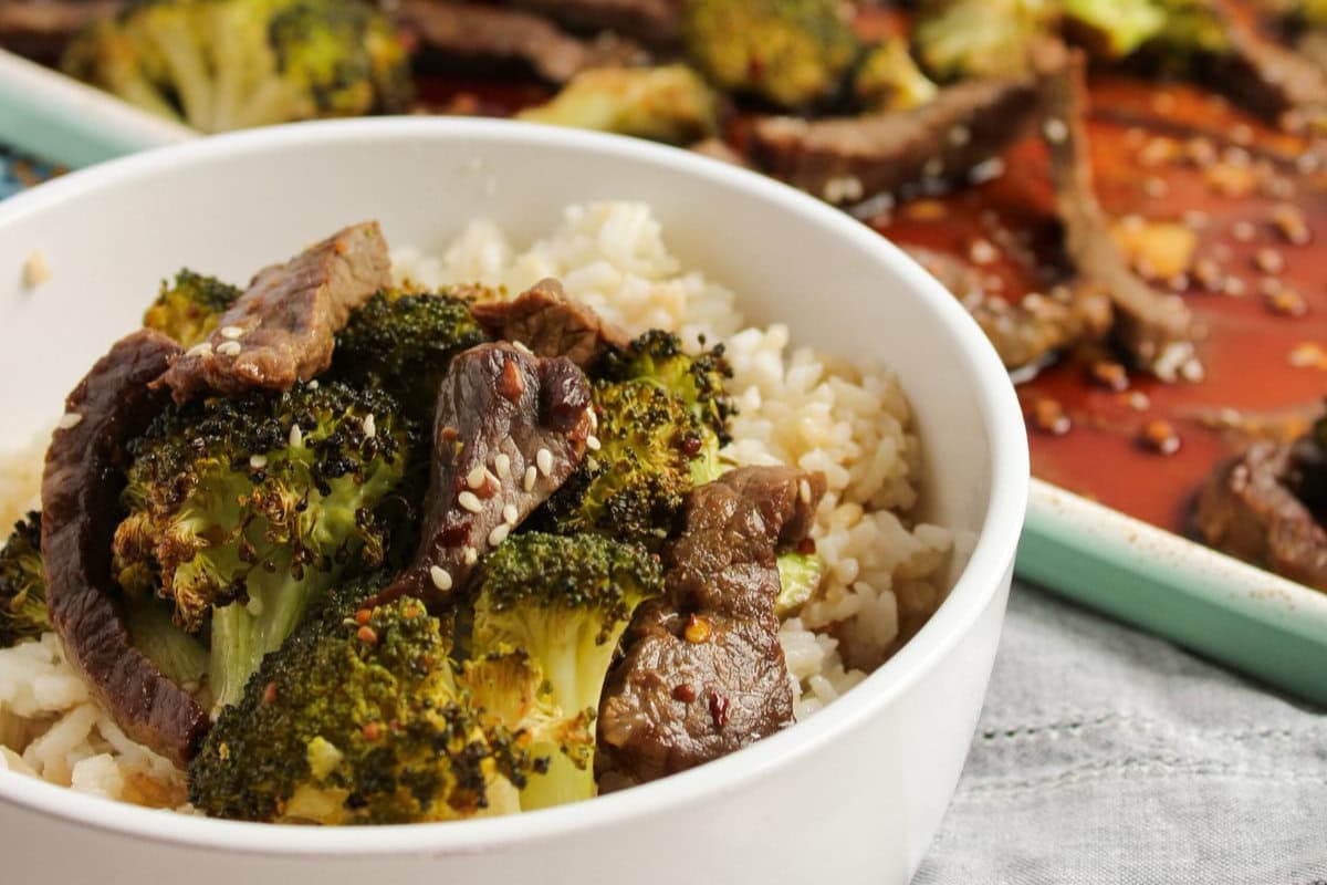 A dish of Sheet Pan Beef and Broccoli.
