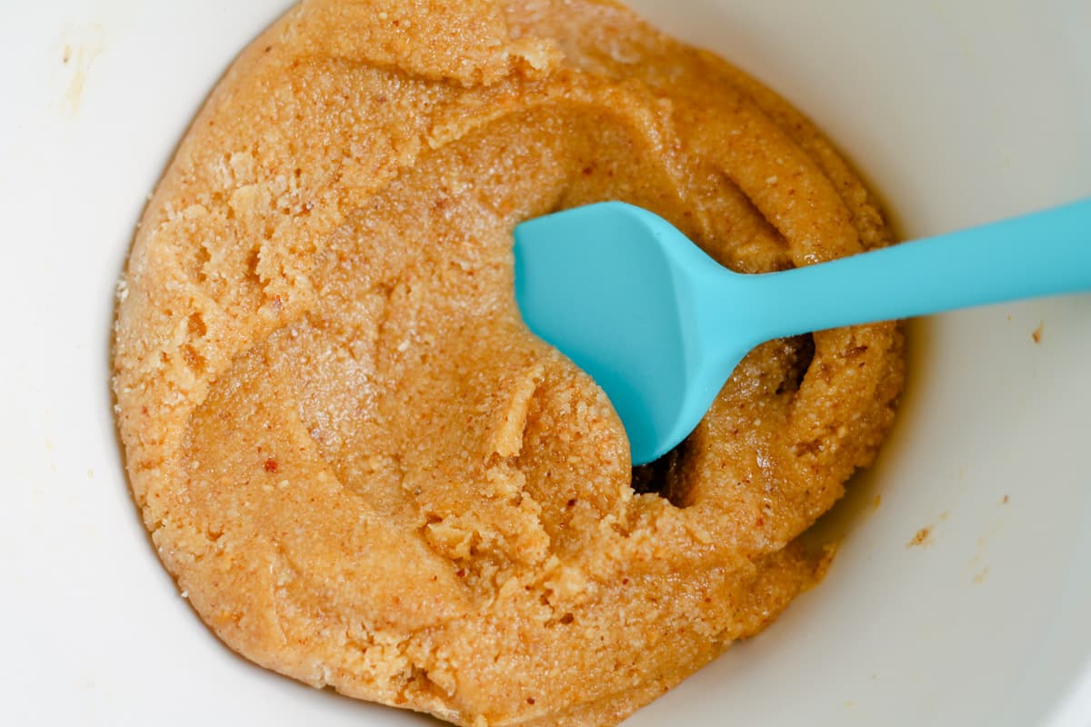 Ingredients being stirred in a bowl.