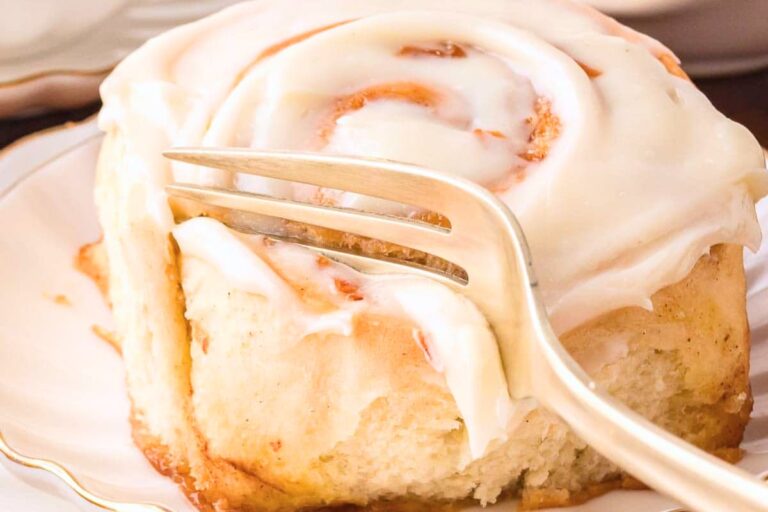 A plate of Carrot Cake Cinnamon Rolls.