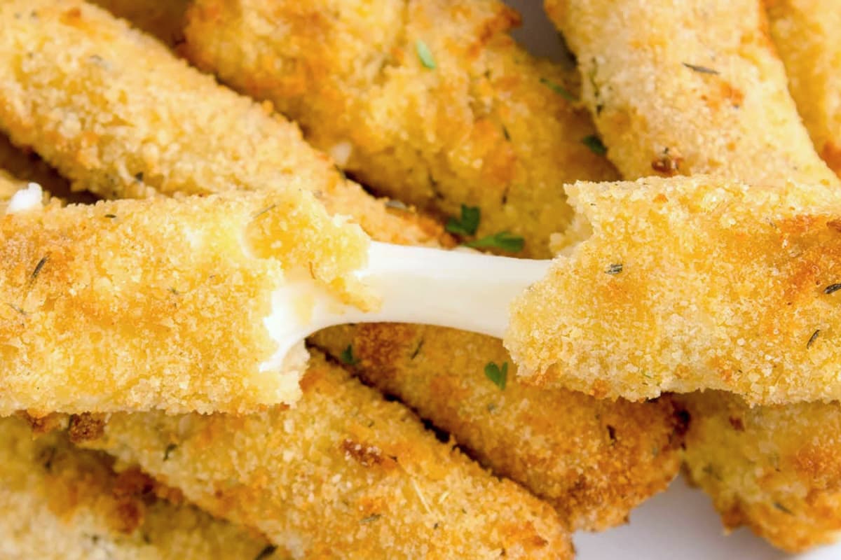 A plate of Air Fryer Mozzarella Sticks.