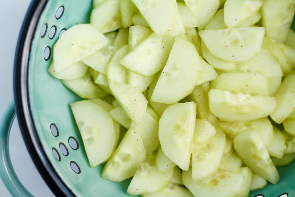 Cucumbers in a colander.
