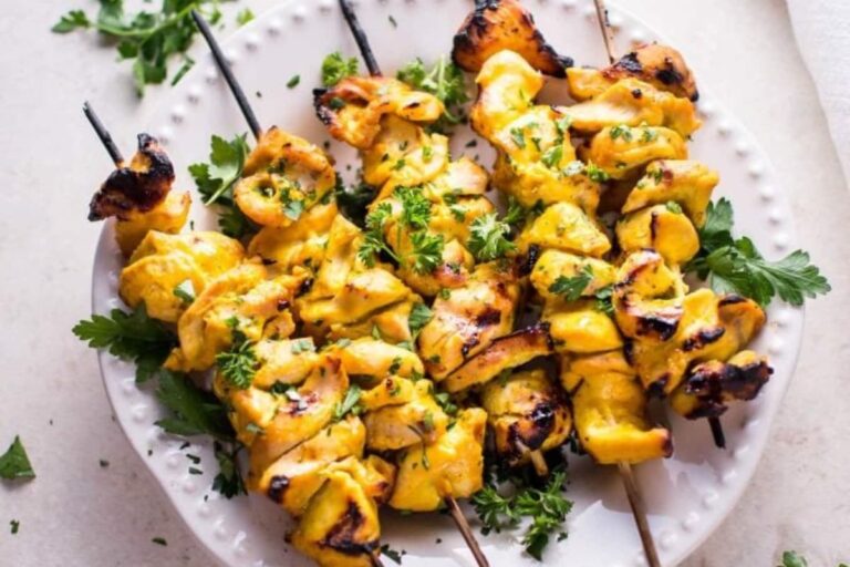 A plate of Grilled Honey Mustard Chicken Skewers.