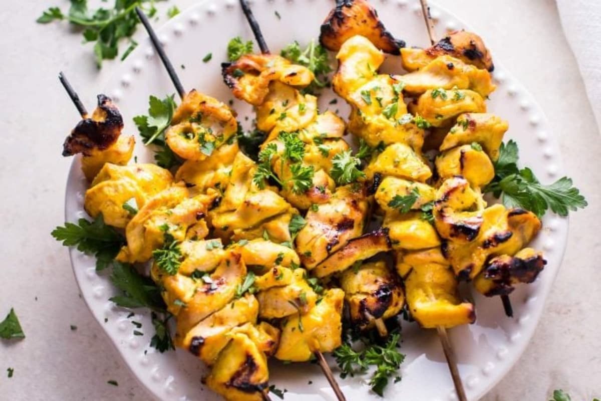 A plate of Grilled Honey Mustard Chicken Skewers.