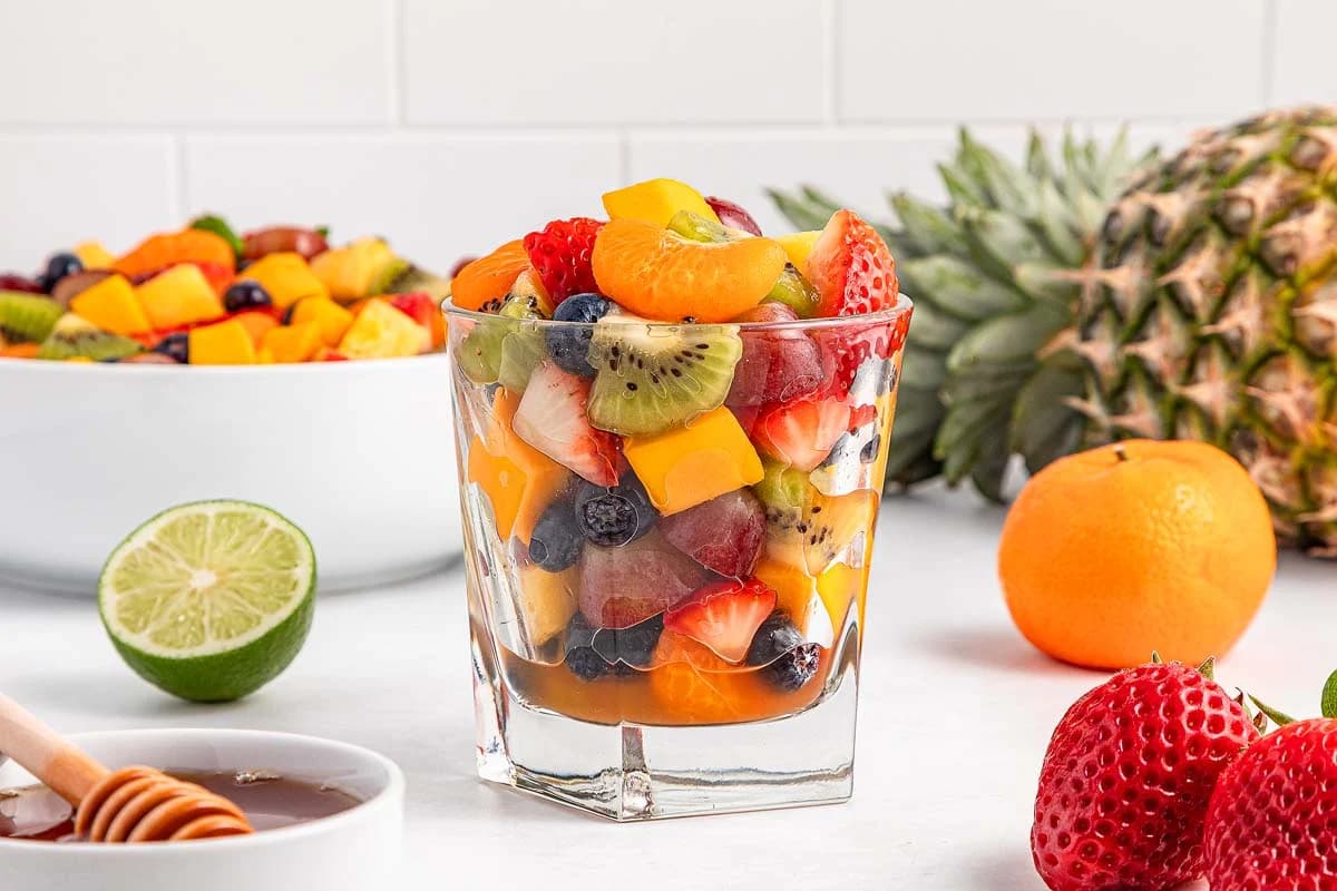 A dish of Honey Lime Fruit Salad.