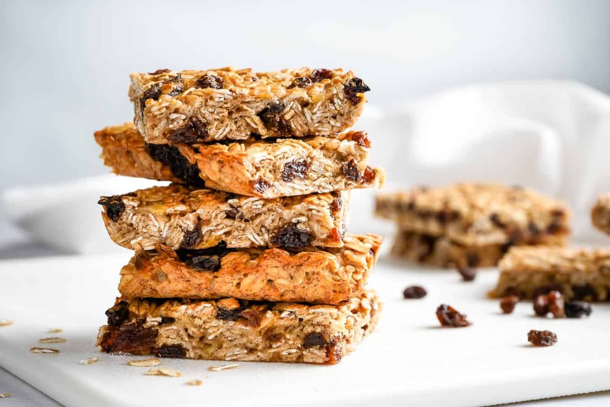 A plate of Easy Oatmeal Raisin Breakfast Bars.