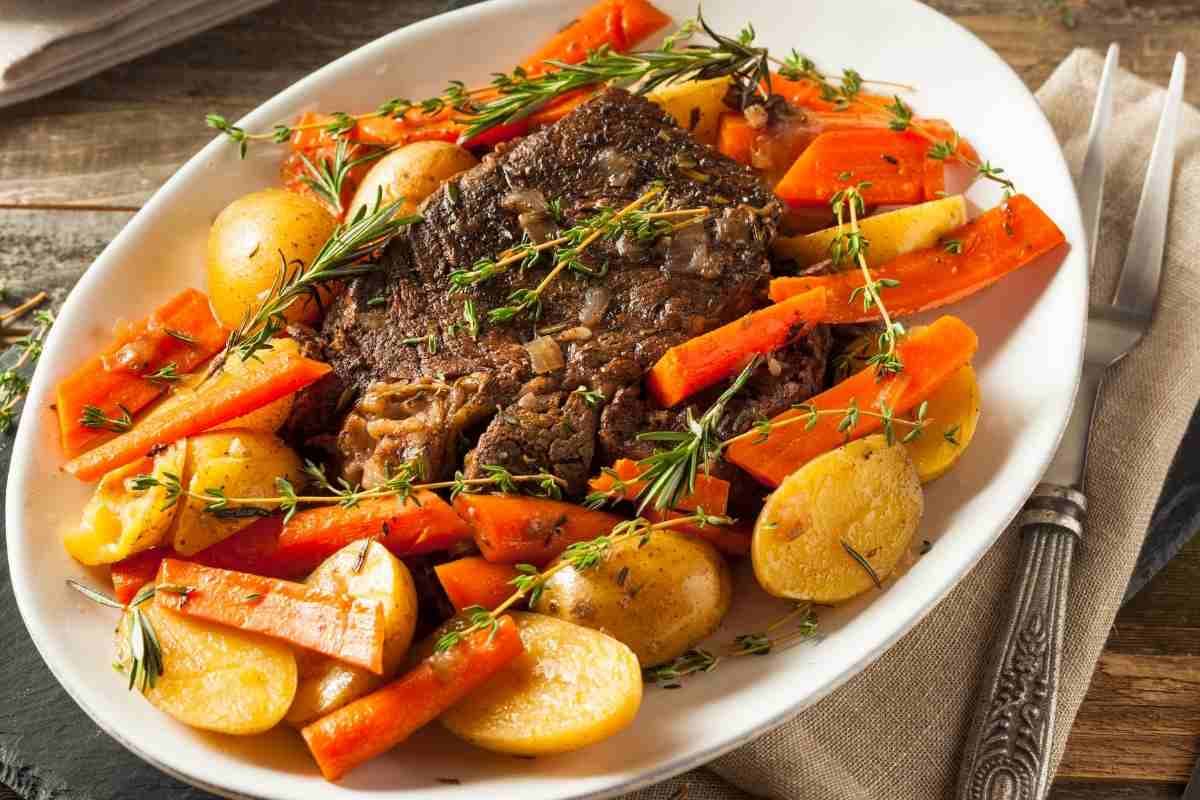 A dish of Crockpot Chuck Roast with Potatoes and Carrots.