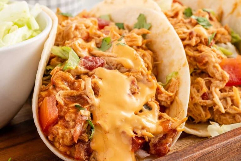 A plate of Slow Cooker Queso Chicken Tacos.