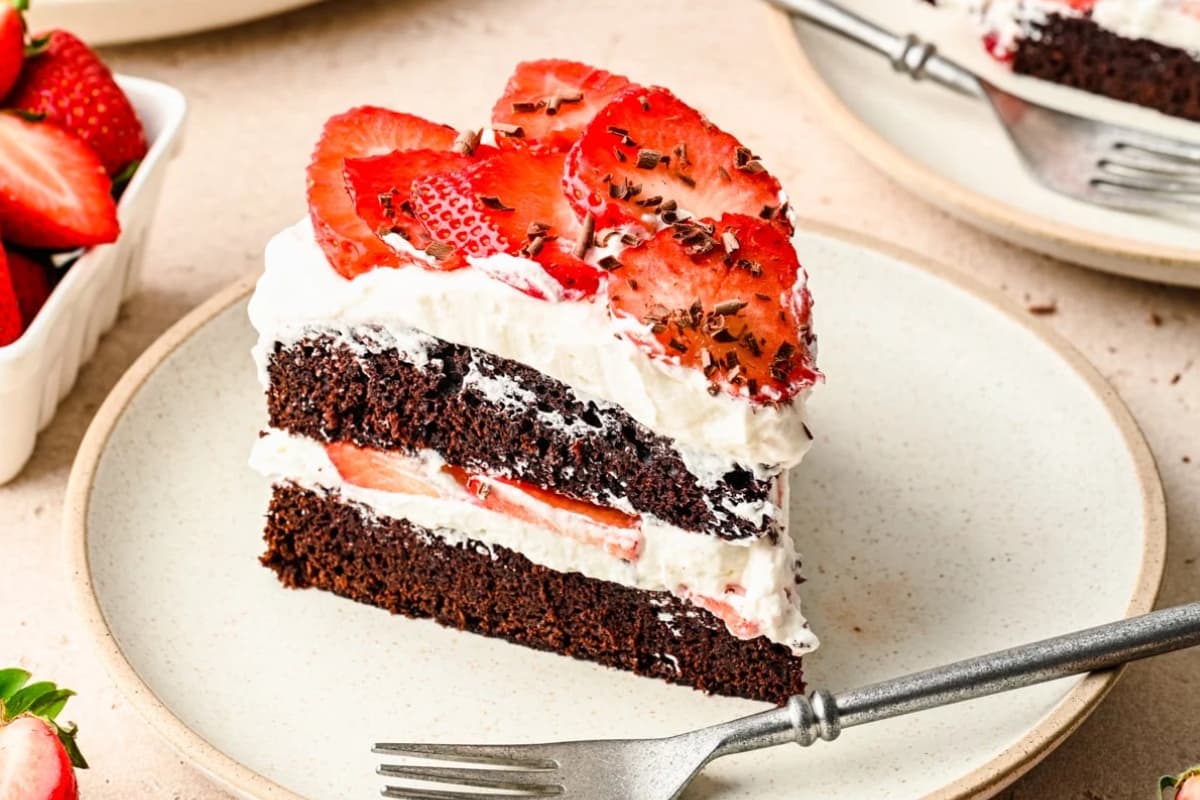 A plate of Chocolate Strawberry Cake.