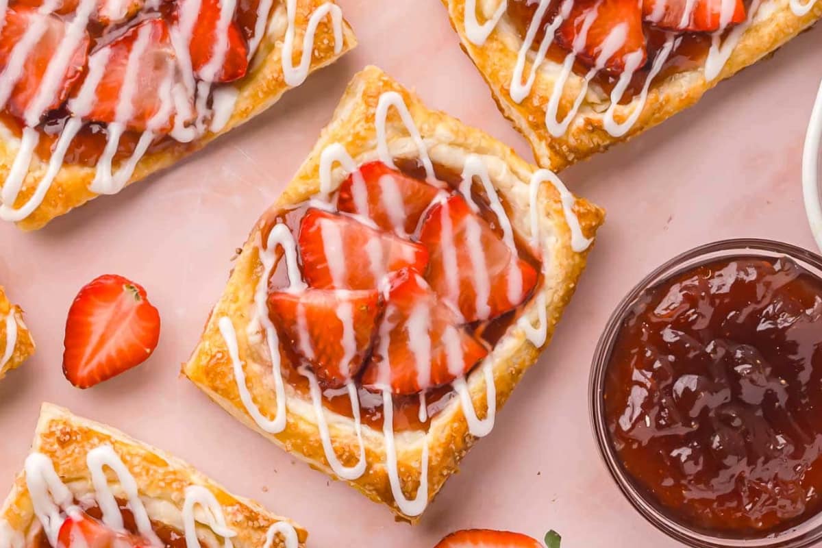 A plate of Strawberry Danish.