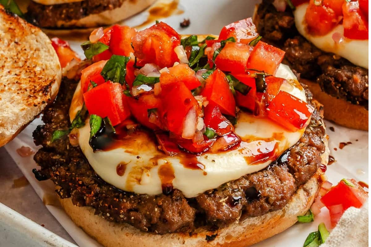A plate of Bruschetta Burgers.