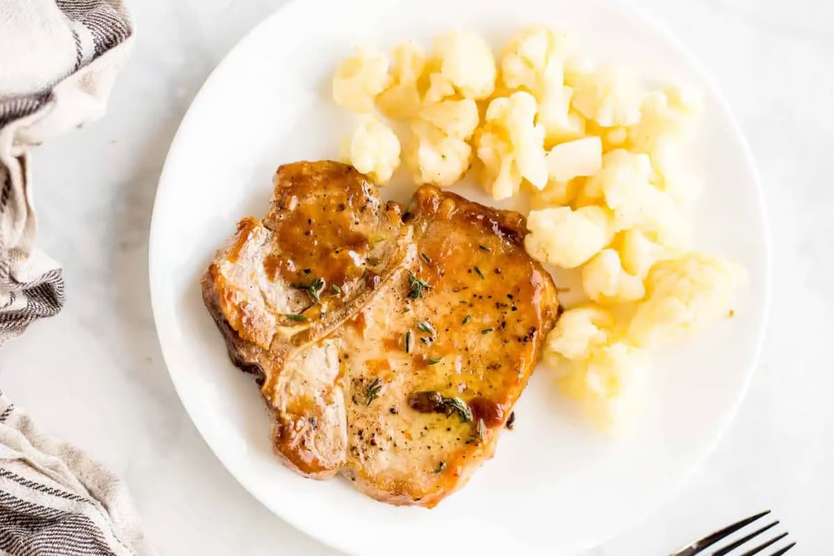 A plate of Honey Glazed Pork Chops.