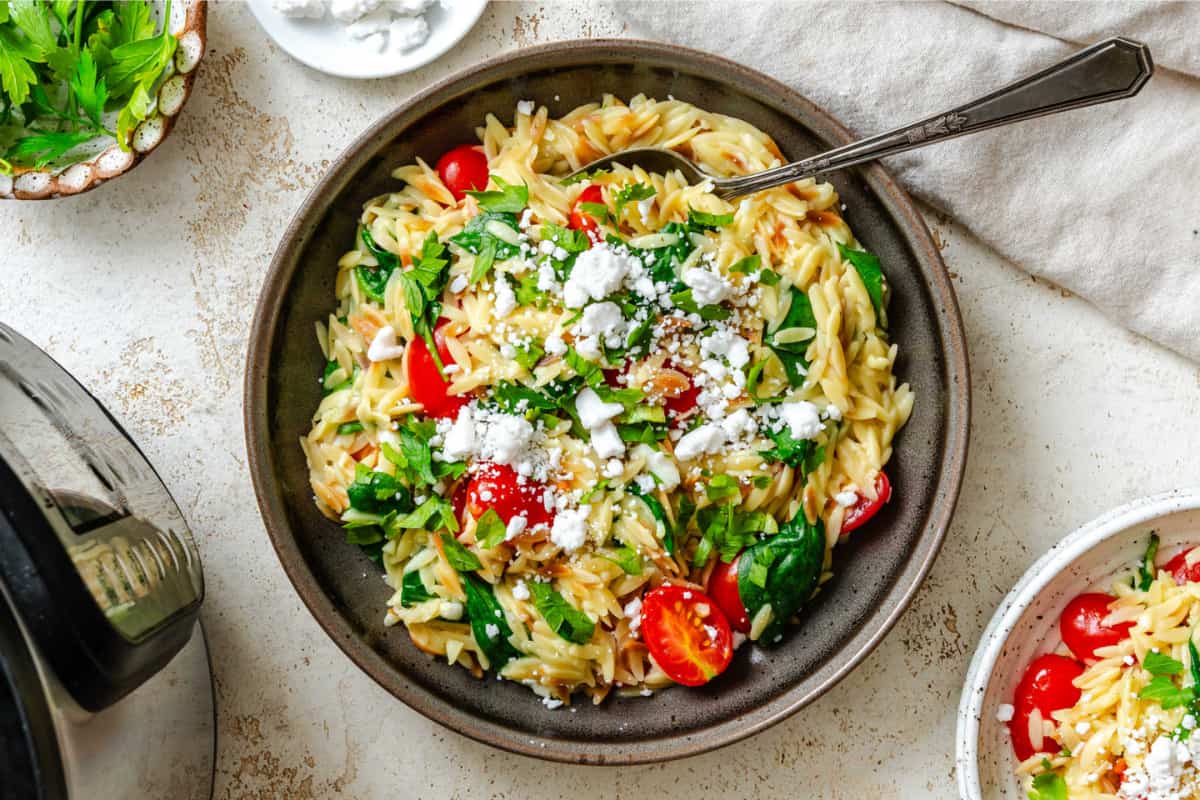 A dish of Instant Pot Garlic Feta Orzo.