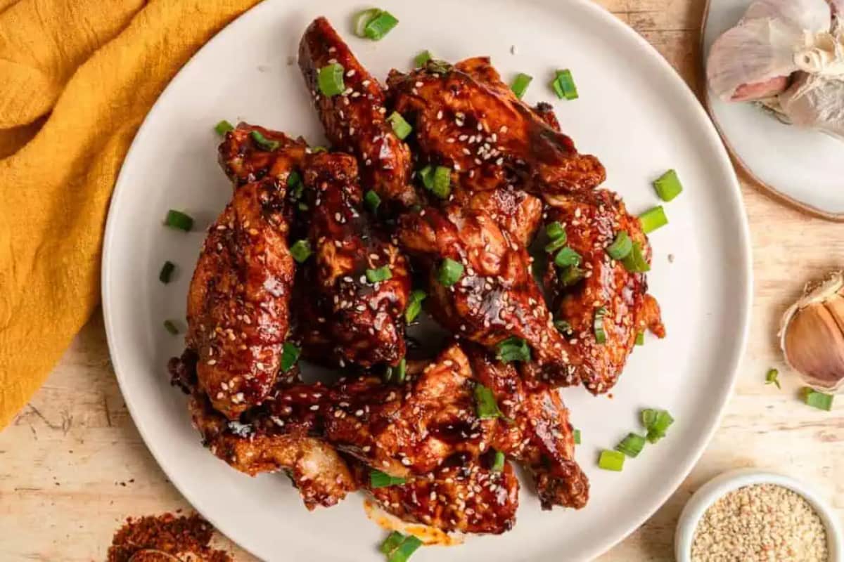 A plate of Gochujang Chicken Wings.